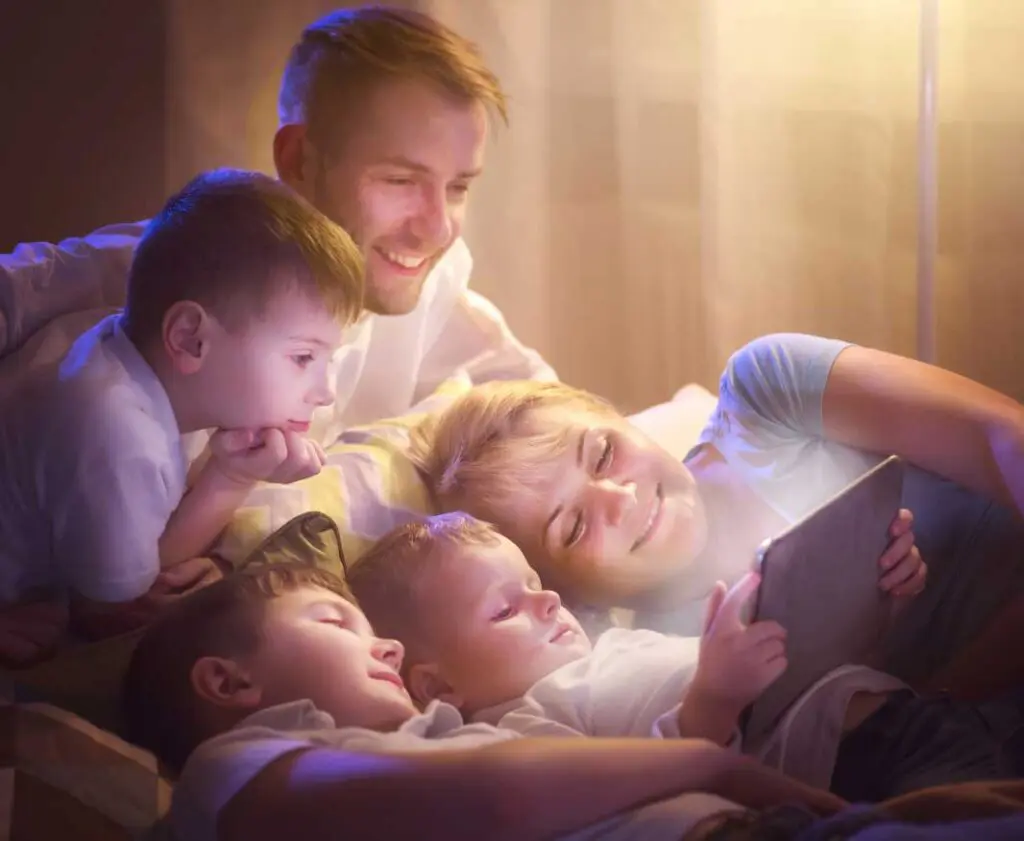 A family enjoy watching Lost on Infinity animated audiobook together. Experience the magic of Rockford's Rock Opera – award-winning musical stories about ecology and extinction for children. Download all apps FREE.